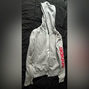 Woman’s Adidas Gray Knit Fabric hooded sweater with red bold letters “adidas”